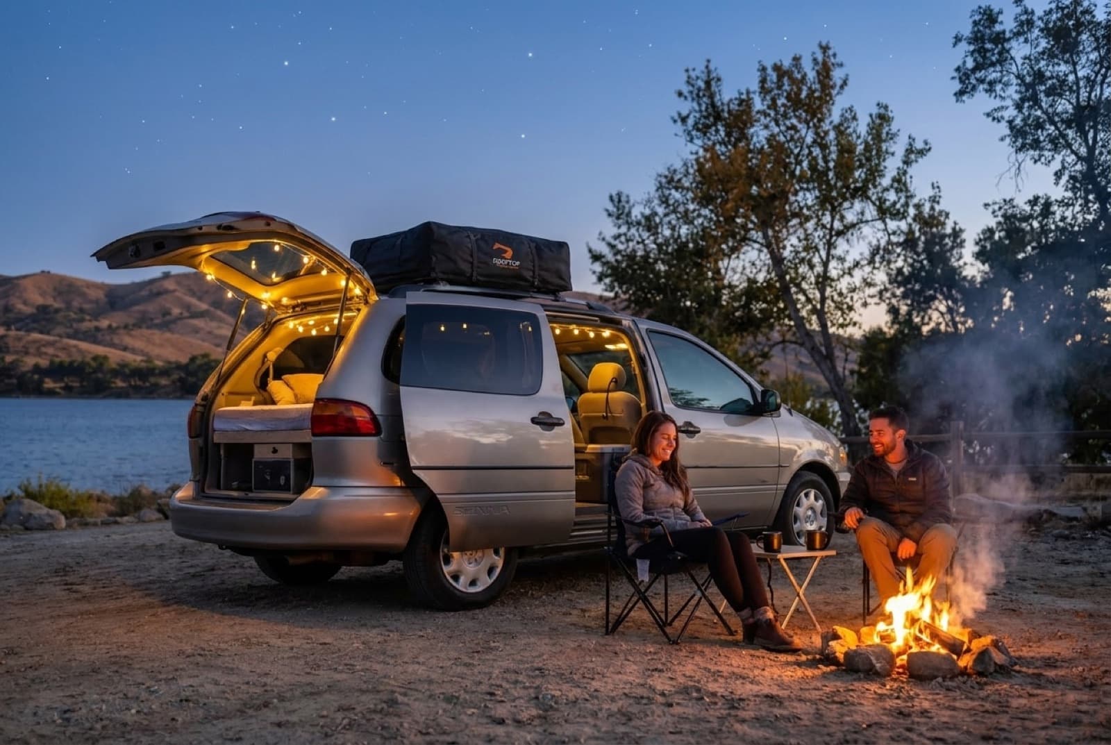 Couple by the campfire at dusk